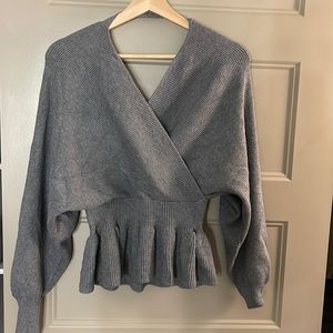 Peplum sweater top